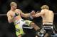 Jan 26, 2013; Chicago, IL, USA; Pascal Krauss (green shorts) fights against Mike Stumpf (black shorts) during UFC on FOX 6 at the United Center. Mandatory Credit: David Banks-USA TODAY Sports