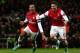 LONDON, ENGLAND - DECEMBER 29: Theo Walcott of Arsenal celebrates scoring his hat trick and Arsenal's seventh goal with Olivier Giroud of Arsenal during the Barclays Premier League match between Arsenal and Newcastle United at the Emirates Stadium on December 29, 2012 in London, England. (Photo by Clive Mason/Getty Images)