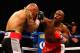 LAS VEGAS, NV - MAY 05: (R-L) Floyd Mayweather Jr.throws a right to the face of Miguel Cotto during their WBA super welterweight title fight at the MGM Grand Garden Arena on May 5, 2012 in Las Vegas, Nevada. (Photo by Al Bello/Getty Images)