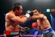 LAS VEGAS, NV - DECEMBER 08: (R-L) Manny Pacquiao throws a left at Juan Manuel Marquez during their welterweight bout at the MGM Grand Garden Arena on December 8, 2012 in Las Vegas, Nevada. (Photo by Al Bello/Getty Images)