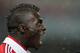 MILAN, ITALY - DECEMBER 13: Mbaye Niang of Milan celebrates after scoring his team's during thsecond goal TIM Cup match between AC Milan and Reggina Calcio at San Siro Stadium on December 13, 2012 in Milan, Italy. (Photo by Maurizio Lagana/Getty Images)