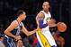 Jan 27, 2013; Los Angeles, CA, USA; Los Angeles Lakers shooting guard Kobe Bryant (24) moves the ball against the defense of Oklahoma City Thunder shooting guard Thabo Sefolosha (2) during the first half at Staples Center. Mandatory Credit: Gary A. Vasquez-USA TODAY Sports