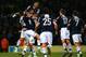 NORWICH, ENGLAND - JANUARY 26: Luton Town players celebrate at the final whistle during the FA Cup with Budweiser fourth round match between Norwich City and Luton Town at Carrow Road on January 26, 2013 in Norwich, England. (Photo by Jan Kruger/Getty Images)