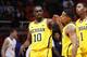 CHAMPAIGN, IL - JANUARY 27: Tim Hardaway Jr. #10 and Trey Burke #3 of the Michigan Wolverines celebrate against the Illinois Fighting Illini during the game at Assembly Hall on January 27, 2013 in Champaign, Illinois. Michigan defeated Illinois 74-60. (Photo by Joe Robbins/Getty Images)
