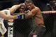Jan 26, 2013; Chicago, IL, USA; Rampage Jackson (black shorts) fights against Glover Teixeira (black and white shorts) during UFC on FOX 6 at the United Center. Mandatory Credit: David Banks-USA TODAY Sports