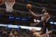 DALLAS, TX - DECEMBER 10: DeMarcus Cousins #15 of the Sacramento Kings takes a shot against Derek Fisher #6 of the Dallas Mavericks at American Airlines Center on December 10, 2012 in Dallas, Texas. NOTE TO USER: User expressly acknowledges and agrees that, by downloading and or using this photograph, User is consenting to the terms and conditions of the Getty Images License Agreement. (Photo by Ronald Martinez/Getty Images)