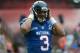 January 27, 2013; Honolulu, HI, USA; NFC quarterback Russell Wilson of the Seattle Seahawks (3) smiles during warm ups before the 2013 Pro Bowl against the AFC at Aloha Stadium. Mandatory Credit: Kyle Terada-USA TODAY Sports