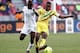 PORT ELIZABETH, SOUTH AFRICA - JANUARY 24: Mubarak Wakaso (L) of Ghana and Seydou Keita of Mali during the 2013 African Cup of Nations match between Mali and Ghana at Nelson Mandela Bay Stadium on January 24, 2013 in Port Elizabeth, South Africa. (Photo by Michael Sheehan/Gallo Images/Getty Images)