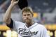 SAN DIEGO, CA - SEPTEMBER 7: Chase Headley #7 of the San Diego Padres tips his cap to the fans after being honored for being the National League Player of the Month for August. before a game against the Arizona Diamondbacks at Petco Park on September 7, 2012 in San Diego, California. (Photo by Denis Poroy/Getty Images)