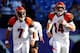 BALTIMORE, MD - SEPTEMBER 10: Quarterback Bruce Gradkowski #7 and quarterback Andy Dalton #14 of the Cincinnati Bengals run on the field before taking on the Baltimore Ravens at M&T Bank Stadium on September 10, 2012 in Baltimore, Maryland. (Photo by Rob Carr/Getty Images)