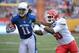 Jan 27, 2013, Honolulu, HI, USA; Arizona Cardinals receiver Larry Fitzgerald (11) stiff arms Kansas City Chiefs linebacker Justin Houston (50) in the 2013 Pro Bowl at Aloha Stadium. The NFC defeated the AFC 62-25. Mandatory Credit: Kirby Lee-USA TODAY Sports