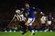 LIVERPOOL, ENGLAND - SEPTEMBER 17: Everton player Marouane Fellaini (r) holds off the challenge of Jonas Gutierrez of Newcastle during the Premier League match between Everton and Newcastle United at Goodison Park on September 17, 2012 in Liverpool, England. (Photo by Stu Forster/Getty Images)