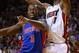 MIAMI, FL - JANUARY 25: Chris Bosh #1 of the Miami Heat is fouled by Rodney Stuckey #3 of the Detroit Pistons during a game at American Airlines Arena on January 25, 2013 in Miami, Florida. (Photo by Mike Ehrmann/Getty Images)