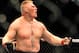 LAS VEGAS - JULY 11: Brock Lesnar reacts after knocking out Frank Mir during their heavyweight title bout during UFC 100 on July 11, 2009 in Las Vegas, Nevada. (Photo by Jon Kopaloff/Getty Images)