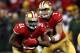 SAN FRANCISCO, CA - JANUARY 12: Quarterback Colin Kaepernick #7 of the San Francisco 49ers hands the ball to running back Frank Gore #21 against the Green Bay Packers during the NFC Divisional Playoff Game at Candlestick Park on January 12, 2013 in San Francisco, California. (Photo by Stephen Dunn/Getty Images)