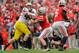 COLUMBUS, OH - NOVEMBER 24: Jake Ryan #47 of the Michigan Wolverines fights through a block from Jake Stoneburner #11 of the Ohio State Buckeyes to chase quarterback Braxton Miller #5 of the Ohio State Buckeyes at Ohio Stadium on November 24, 2012 in Columbus, Ohio. (Photo by Jamie Sabau/Getty Images)