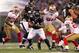 November 24, 2011; Baltimore, MD, USA; Baltimore Ravens running back Ricky Williams (34) runs during the game against the San Francisco 49ers on Thanksgiving at M&T Bank Stadium. The Ravens beat the 49ers 16-6. Mandatory Credit: Mitch Stringer-USA TODAY Sports