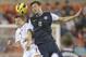HOUSTON,TX - JANUARY 29: Brad Evans #8 of the USA goes up for a header against Terry Dunfield #7 of Canada in the first half at BBVA Compass Stadium on January 29, 2013 in Houston, Texas. (Photo by Bob Levey/Getty Images)