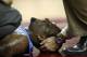 Jan 29, 2013; Chestnut Hill, Massachusetts, USA; A trainer holds the neck of North Carolina Tar Heels guard P.J. Hairston (15) after he was injured during the first half against the Boston College Eagles at Conte Forum. Mandatory Credit: Greg M. Cooper-USA TODAY Sports