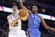 January 23, 2013; Oakland, CA, USA; Golden State Warriors guard Klay Thompson (11) attempts a shot in the lane next to Oklahoma City Thunder forward Kevin Durant (35) in the second quarter at ORACLE Arena. Mandatory Credit: Cary Edmondson-USA TODAY Sports