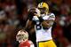 SAN FRANCISCO, CA - JANUARY 12: wide receiver Greg Jennings #85 of the Green Bay Packers catches a pass over cornerback Carlos Rogers #22 of the San Francisco 49ers during the NFC Divisional Playoff Game at Candlestick Park on January 12, 2013 in San Francisco, California. (Photo by Thearon W. Henderson/Getty Images)