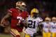 SAN FRANCISCO, CA - JANUARY 12: Quarterback Colin Kaepernick #7 of the San Francisco 49ers runs the ball against strong safety Charles Woodson #21 of the Green Bay Packers during the NFC Divisional Playoff Game at Candlestick Park on January 12, 2013 in San Francisco, California. (Photo by Stephen Dunn/Getty Images)