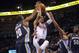 Nov 14, 2012; Oklahoma City, OK, USA; Oklahoma City Thunder guard Russell Westbrook (0) attempts a shot against Memphis Grizzlies forward Quincy Poindexter (20) and Grizzlies guard Mike Conley (11) during the first half at Chesapeake Energy Arena. Mandatory Credit: Mark D. Smith-USA TODAY Sports