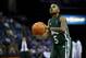Dec 5, 2012; Memphis, TN, USA; Ohio Bobcats guard D.J. Cooper (5) shoots a free throw during the game against the Memphis Tigers at the FedEx Forum. Memphis Tigers defeated the Ohio Bobcats 84-58. Mandatory Credit: Spruce Derden–USA TODAY Sports