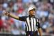 Dec. 16, 2012; Glendale, AZ, USA: NFL referee Jerome Boger signals first down during the game between the Arizona Cardinals against the Detroit Lions at University of Phoenix Stadium. Mandatory Credit: Mark J. Rebilas-USA TODAY Sports