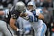 Dec 18, 2011; Oakland, CA, USA; Detroit Lions defensive tackle Ndamukong Suh (90) is defended by Oakland Raiders guard Cooper Carlisle (66) at the O.co Coliseum. The Lions defeated the Raiders 28-27. Mandatory Credit: Kirby Lee/Image of Sport-USA TODAY Sports
