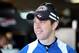 CHARLOTTE, NC - JANUARY 18: Brad Keselowski, driver of the #2 Miller Lite, looks on in the garage during NASCAR Testing at Charlotte Motor Speedway on January 18, 2013 in Charlotte, North Carolina. (Photo by Streeter Lecka/Getty Images for NASCAR)