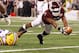 ARLINGTON, TX - JANUARY 07: Uzoma Nwachukwu #7 of the Texas A&M Aggies scores a touchdown over Kelvin Sheppard #11 of the Louisiana State University Tigers during the AT&T Cotton Bowl at Cowboys Stadium on January 7, 2011 in Arlington, Texas. (Photo by Chris Graythen/Getty Images)