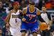 Nov 28, 2012; Milwaukee, WI, USA; New York Knicks forward Carmelo Anthony (7) dribbles the ball as Milwaukee Bucks guard Marquis Daniels (6) defends during the game at the BMO Harris Bradley Center. The Knicks defeated the Bucks 102-88. Mandatory Credit: Jeff Hanisch-USA TODAY Sports