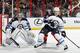 SUNRISE, FL - JANUARY 31: Tobias Enstrom #39 of the Winnipeg Jets assists goaltender Ondrej Pavelec #31 defend the net against Jonathan Huberdeau #11 of the Florida Panthers at the BB&T Center on January 31, 2013 in Sunrise, Florida. (Photo by Joel Auerbach/Getty Images)