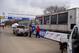 City of Louisville workers put the finishing touches on the start/finish line.