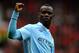 MANCHESTER, ENGLAND - OCTOBER 23: Mario Balotelli of Manchester City celebrates scoring his team's second goal during the Barclays Premier League match between Manchester United and Manchester City at Old Trafford on October 23, 2011 in Manchester, England. (Photo by Laurence Griffiths/Getty Images)