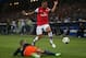 MONTPELLIER, FRANCE - SEPTEMBER 18: Garry Bocaly of Montpellier tackles Kieran Gibbs of Arsenal during the UEFA Champions League match between Montpellier Herault SC and Arsenal at Stade de la Mosson on September 18, 2012 in Montpellier, France. (Photo by Julian Finney/Getty Images)
