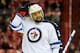 WASHINGTON, DC - JANUARY 22: Dustin Byfuglien #33 of the Winnipeg Jets rests during a break in the game against the Washington Capitals at the Verizon Center on January 22, 2013 in Washington, DC. (Photo by Greg Fiume/Getty Images)
