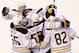 BOSTON, MA - JANUARY 31: Jochen Hecht #55, Christian Ehrhoff #10, Alexander Sulzer #52 and Marcus Foligno #82 of the Buffalo Sabres celebrate a third period goal against the Boston Bruins during a game at the TD Garden on January 31, 2013 in Boston, Massachusetts. The Sabres defeated the Bruins 7-4. (Photo by Alex Trautwig/Getty Images)