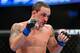 August 11, 2012; Denver, CO, USA; Frankie Edgar fights Benson Henderson (not pictured) during UFC 150 at the Pepsi Center. Mandatory Credit: Ron Chenoy-USA TODAY Sports