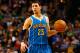 BOSTON, MA - JANUARY 16: Austin Rivers #25 of the New Orleans Hornets carries the ball down the court against the Boston Celtics during the game on January 16, 2013 at TD Garden in Boston, Massachusetts. NOTE TO USER: User expressly acknowledges and agrees that, by downloading and or using this photograph, User is consenting to the terms and conditions of the Getty Images License Agreement. (Photo by Jared Wickerham/Getty Images)