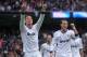 MADRID, SPAIN - JANUARY 27: Cristiano Ronaldo (L) of Real Madrid CF celebrates with Mesut Ozil after scoreding Real's 2nd goal during the La Liga match between Real Madrid CF and Getafe CF at estadio Santiago Bernabeu on January 27, 2013 in Madrid, Spain. (Photo by Denis Doyle/Getty Images)
