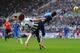 NEWCASTLE UPON TYNE, ENGLAND - FEBRUARY 02: Demba Ba of Chelsea is kicked in the face by Fabricio Coloccini of Newcastle United during the Barclays Premier League match between Newcastle United and Chelsea at St James' Park on February 2, 2013 in Newcastle upon Tyne, England. (Photo by Laurence Griffiths/Getty Images)