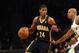 NEW YORK, NY - JANUARY 13: Paul George #24 of the Indiana Pacers dribbles the ball against the Brooklyn Nets at the Barclays Center on January 13, 2013 in New York City. NOTE TO USER: User expressly acknowledges and agrees that, by downloading and/or using this photograph, user is consenting to the terms and conditions of the Getty Images License Agreement. (Photo by Bruce Bennett/Getty Images)