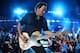 TAMPA, FL - FEBRUARY 01: Musician Bruce Springsteen and the E Street Band perform at the Bridgestone halftime show during Super Bowl XLIII between the Arizona Cardinals and the Pittsburgh Steelers on February 1, 2009 at Raymond James Stadium in Tampa, Florida. (Photo by Jamie Squire/Getty Images)