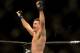 Jul. 7, 2012; Las Vegas, NV, USA; UFC fighter Demian Maia (left) celebrates his win over Dong Hyun Kim during a welterweigh bout in UFC 148 at the MGM Grand Garden Arena. Mandatory Credit: Mark J. Rebilas-USA TODAY Sports