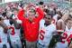 EAST LANSING, MI - SEPTEMBER 29: Head coach Urban Meyer of the Ohio State Buckeyes celebrates with his players after beating the Michigan State Spartans 17-16 at Spartan Stadium on September 29, 2012 in East Lansing, Michigan. (Photo by Gregory Shamus/Getty Images)