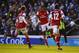 BRIGHTON, ENGLAND - JANUARY 26: Theo Walcott of Arsenal (C) celebrates with Aaron Ramsey (16) and Olivier Giroud (12) as her scores their third goal during the FA Cup with Budweiser Fourth Round match between Brighton & Hove Albion and Arsenal at Amex Stadium on January 26, 2013 in Brighton, England. (Photo by Mike Hewitt/Getty Images)