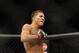 Jan 26, 2013; Chicago, IL, USA; Anthony Pettis celebrates after defeating Donald Cerrone (not pictured) during UFC on FOX 6 at the United Center. Mandatory Credit: David Banks-USA TODAY Sports