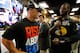 DAYTONA BEACH, FL - FEBRUARY 26: Professional wrestler John Cena (L) talks with Justin Tuck (R) #91 of the New York Giants in the drivers meeting prior to the start of the NASCAR Sprint Cup Series Daytona 500 at Daytona International Speedway on February 26, 2012 in Daytona Beach, Florida. (Photo by Chris Graythen/Getty Images)